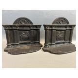 Vintage Cast Iron Bookends , Spinning Scene