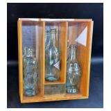 Coca-Cola Bottles in Display Case History of