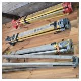 Survey Tripods on Wall