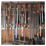 Lot of 34 Furniture Clamps on Wall