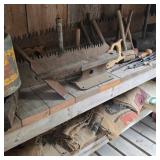 Contents of Shelves: Tools & Potato Sacks