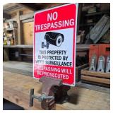 Craftsman Vise Holding Metal No Trespassing Sign