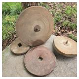 Lot of Grindstones on Porch