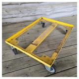 Yellow Metal Four Wheel Dolly