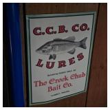 Small Metal C. C. B. Co. Lures Sign in Front Room