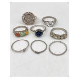 8 RINGS MARKED 925 SILVER