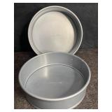 2 NOS CALPHALON 9 IN. SPRING LOADED BAKING PANS