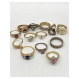 FASHION JEWELRY RINGS A COUPLE MARKED GOLD PLATE,