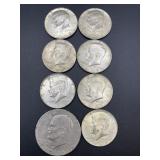 BI-CENTENNIAL EISENHOWER DOLLAR W/ 7 KENNEDY HALF