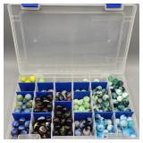 URANIUM CATS EYE AND OTHER GKASS MARBLES IN