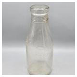 P.M. DAIRY CO. 1 QUART MILK BOTTLE
