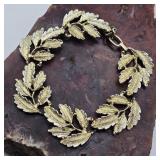 Star Crest Gold Tone Leaf Bracelet