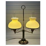 vintage double-arm brass student lamp featuring