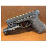 Glock 23 in 40cal with Streamlight TLR-1 HL