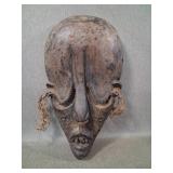African Dan-style hand-carved wooden mask