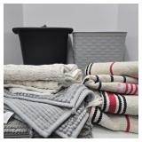 BATHROOM RUGS, OTHER RUGS, SMALL TRASH CANS IN A