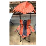 Lawn chair with a top canopy