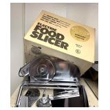 Electric food slicer by rival