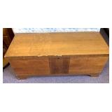 Cedar chest some ware on top