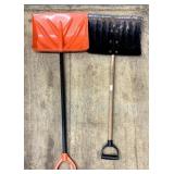 Plastic and metal snow shovels