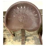 Vintage metal tractor seat