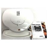 Lean mean fat grilling machine