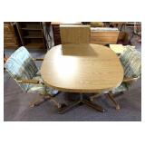 Kitchen table and two chairs on wheels