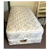 Twin size bed with frame