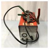 Heavy duty battery charger/booster has power