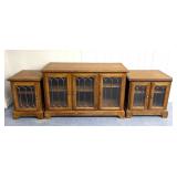 3 matching wooden stands with glass door displays