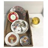 Christmas plates and snow globe