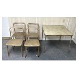 Card table and folding chairs some marks