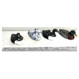 4 duck figurines