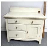 Primitive cabinet with three drawers one door