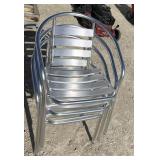 3 decorative patio chairs/stackable