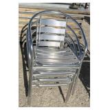 4 decorative patio chairs/stackable