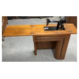 Vintage singer, sewing machine and cabinet