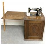 Antique Minnesota model H sewing machine cabinet