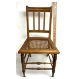 antique-style side chair features a spindle back