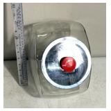 vintage glass penny candy jar features a tilted