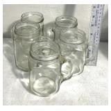 5 canning style glass jars with mugs