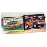 Vintage model car boxes with some parts