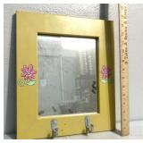 Floral themed wall hanging mirror