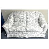 Floral patterned loveseat