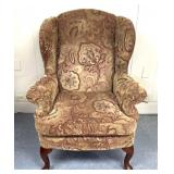Vintage cushioned high back chair