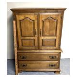 armoire features walnut construction with