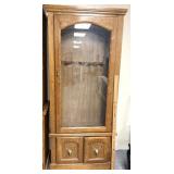 oak pew pew  cabinet features a lockable glass