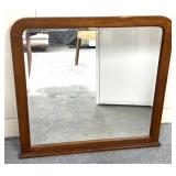 Wall hanging mirror has a mark 35" x 35ï¿½