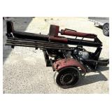 Homemade log splitter on a truck axle missing
