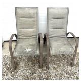 2 stackable chairs, one with ware